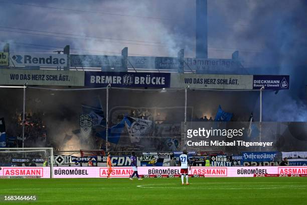 Fans of Hamburg with bengal fire during the Second Bundesliga match between VfL Osnabrück and Hamburger SV at Stadion an der Bremer Brücke on...