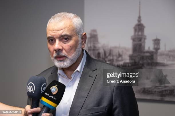 Chairman of the Hamas Political Bureau, Ismail Haniyeh speaks to press as he pays a visit to Palestinian photojournalist Ashraf Amra, a freelancer...