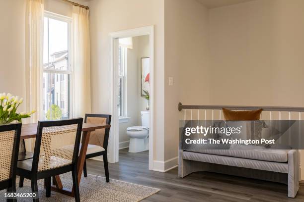 Landing, powder room and dining area in the Louisa model townhome at Gateway West on August 31, 2023 in Hyattsville Maryland.