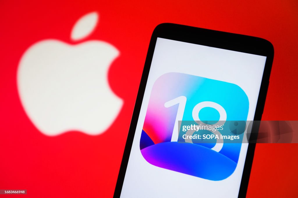 In this photo illustration, iOS 18 logo is seen on a...