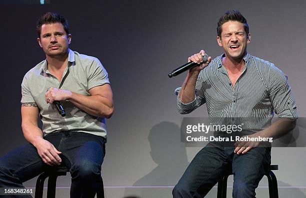 Musicians Nick Lachey and Jeff Timmons of 98 Degrees at Apple Store Soho on May 8, 2013 in New York City.