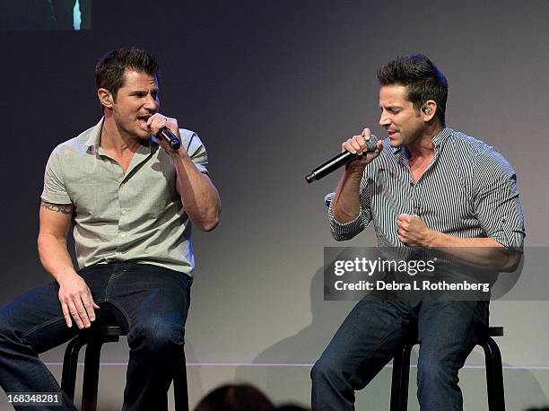 Musicians Nick Lachey and Jeff Timmons of 98 Degrees at Apple Store Soho on May 8, 2013 in New York City.