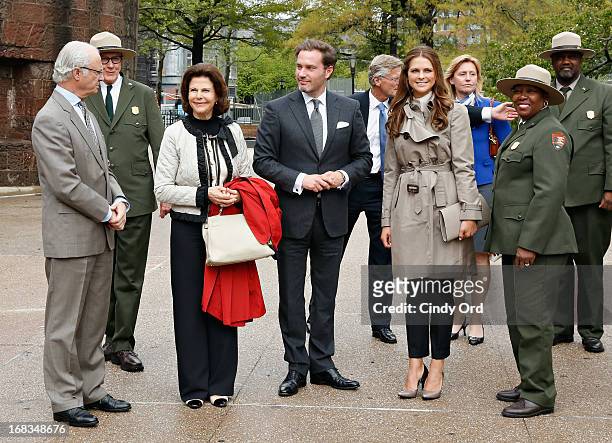 King Carl XVI Gustaf of Sweden, Queen Silvia of Sweden and Princess Madeleine of Sweden joined by Princess Madeleine's fiance Chris O'Neill are seen...