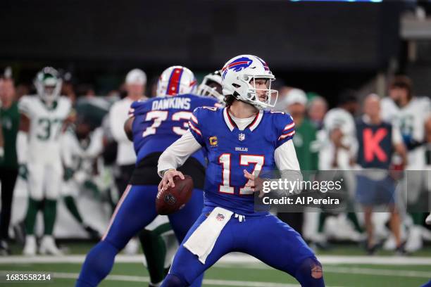 Quarterback Josh Allen of the Buffalo Bills passes the ball in the game between the Buffalo Bills vs the New York Jets on Monday Night Football at...