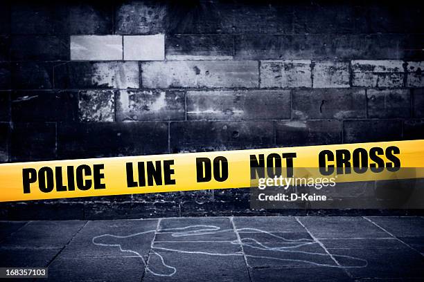 yellow police line on crime scene - bodyline stock pictures, royalty-free photos & images