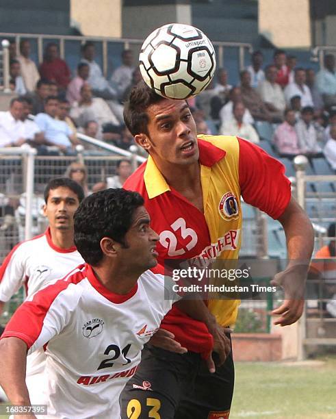 Robin Singh of East Bengal Club and Amrit Pal Singh of Air India vie for ball during the 123rd Edition of Durand Football Tournament at Ambedkar...