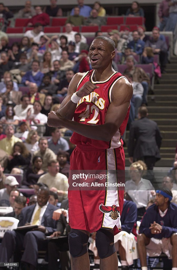 Theo Ratliff of the Atlanta Hawks expresses his feelings about a foul ...