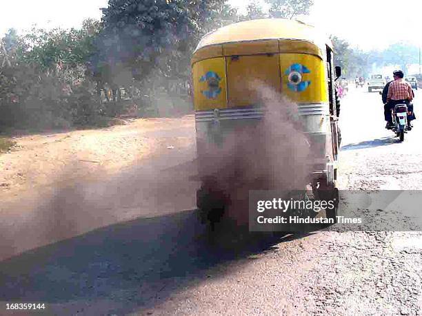 Smoke coming out of Autorickshaw on October 21, 2010 in Faridabad, India.