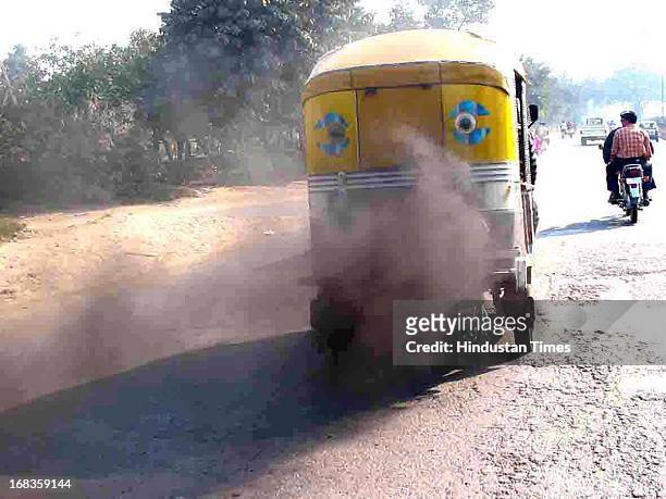 Smoke coming out of Autorickshaw on October 21, 2010 in Faridabad, India.