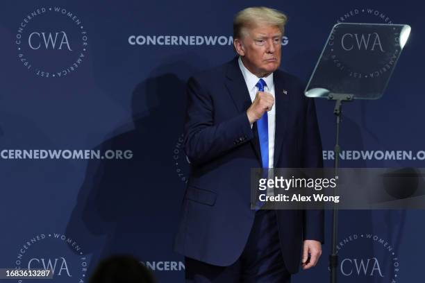 Former U.S. President Donald Trump gestures after addressing the Concerned Women for America Legislative Action Committee on September 15, 2023 in...