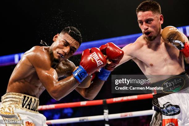 Ruben Villa punches Brandon Valdes during their featherweight fight at American Bank Center on September 15, 2023 in Corpus Christi, Texas.