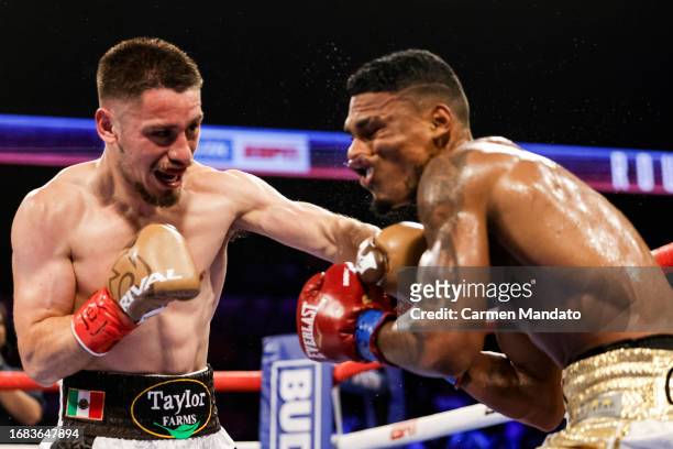 Ruben Villa punches Brandon Valdes during their featherweight fight at American Bank Center on September 15, 2023 in Corpus Christi, Texas.