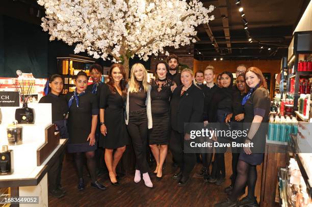 Penny Grivea , Managing Director of Rituals UK & IE, and Fearne Cotton pose with staff at the Rituals Oxford Street flagship store opening on...