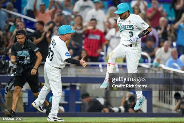 Luis Arraez of the Miami Marlins rounds the bases after scoring a home run against the Atlanta Braves during the seventh inning at loanDepot park on...