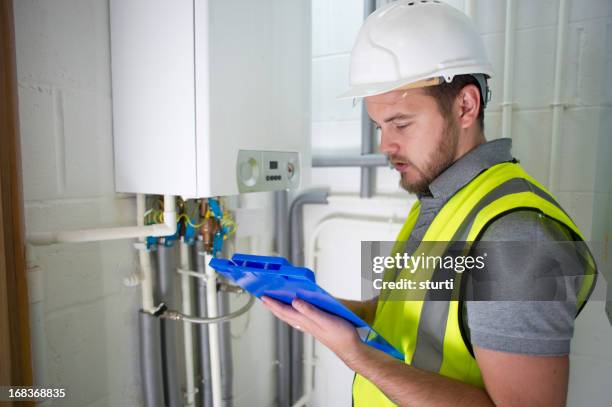 heating engineer - boiler stockfoto's en -beelden