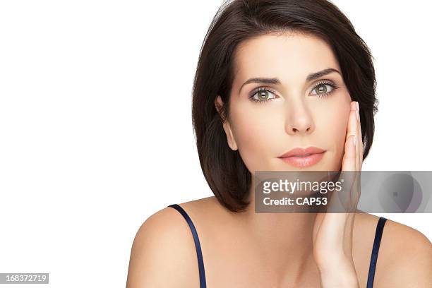 beautiful woman taking care of her skin - brown hair model stock pictures, royalty-free photos & images