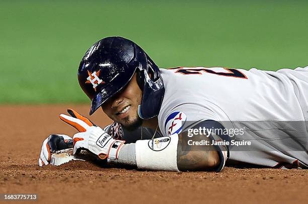 Catcher Martin Maldonado of the Houston Astros reacts after safely sliding into second base for a double during the game against the Kansas City...