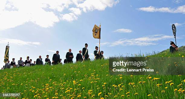 Villagers wearing Bavarian folk costumes specific to the Chiemsee region of southern Bavaria participate in the annual Ascension Day procession on...