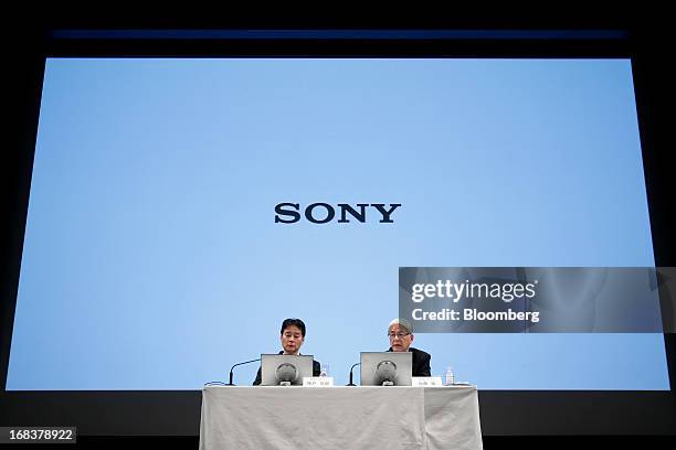 Masaru Kato, executive vice president and chief financial officer of Sony Corp., right, speaks as Shiro Kambe, senior vice president of corporate...