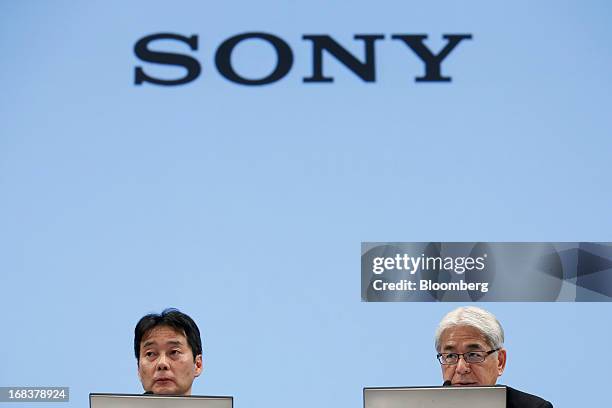 Masaru Kato, executive vice president and chief financial officer of Sony Corp., right, speaks as Shiro Kambe, senior vice president of corporate...