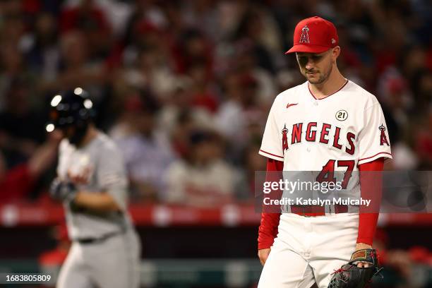 Griffin Canning of the Los Angeles Angels reacts after giving up a home run to Jake Rogers of the Detroit Tigers during the sixth inning at Angel...
