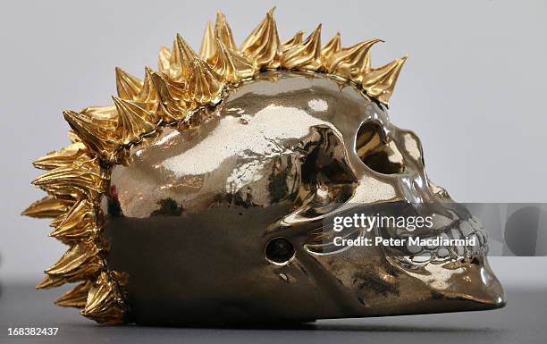 Barbara Roling's earthenware skull is shown at the Collect art fair at Saatchi Gallery on May 9, 2013 in London, England. Celebrating its 10th...