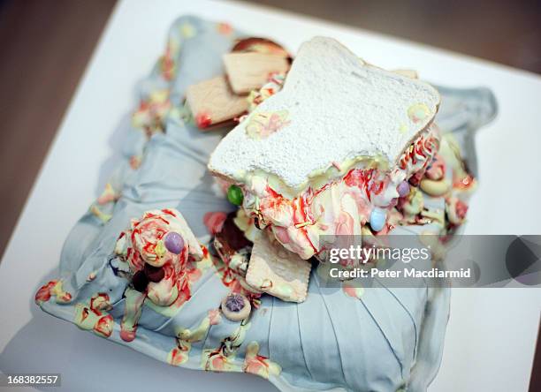 Ceramic sculpture of melting ice cream by artist Anna Barlow is displayed at the Collect art fair at Saatchi Gallery on May 9, 2013 in London,...