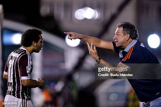 Coach Abel Braga of Fluminense talks to Wellington Nem during the match between Fluminense and Emelec as part of Libertadores Cup 2013 at Sao...