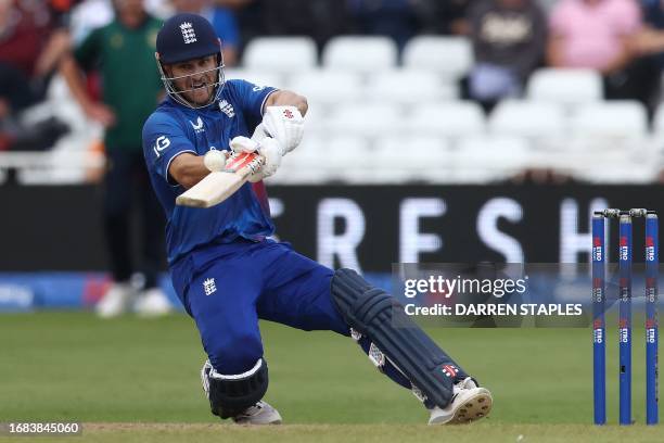 England's Sam Hain hits a four during the second One Day International cricket match between England and Ireland at Trent Bridge cricket ground in...