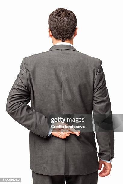 businessman crossing fingers behind his back - isolated - fingers crossed in the back stock pictures, royalty-free photos & images