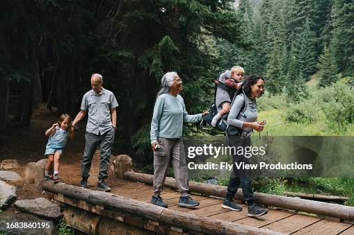 Multiracial multigenerational family on a hike Multiracial multigenerational family on a hike