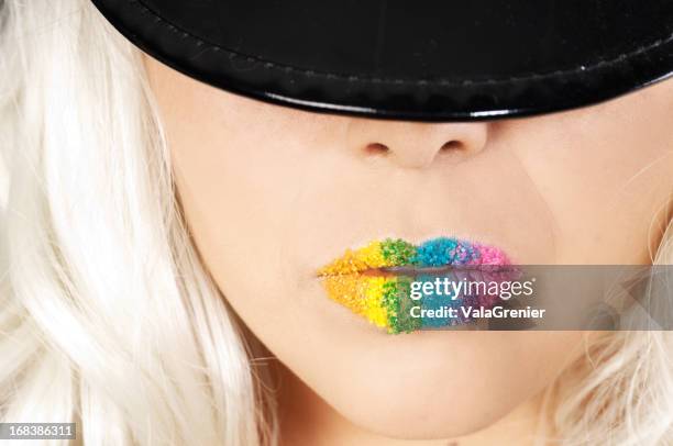 lower face of blonde with colourful lips. - close up of beautiful young blonde woman with black hat stock pictures, royalty-free photos & images