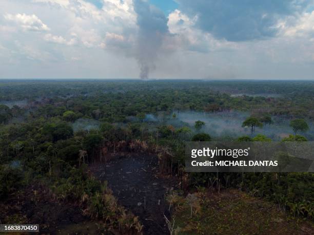 This aerial view shows a deforested and burning area of the Amazon rainforest in Autazes, Amazonas, Brazil, on September 22, 2023. According to the...