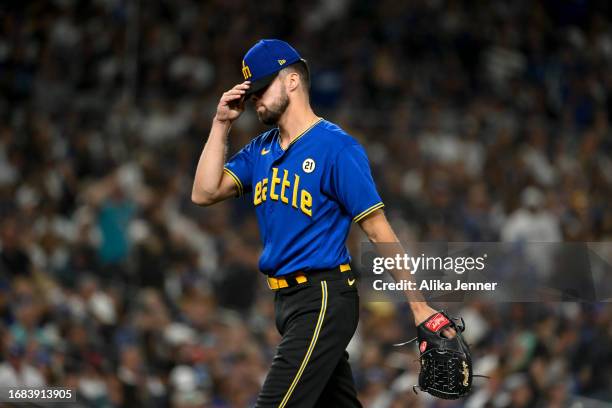 Matt Brash of the Seattle Mariners reacts to giving up a run during the eighth inning against the Los Angeles Dodgers at T-Mobile Park on September...