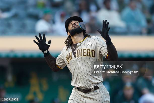 Fernando Tatis Jr. #23 of the San Diego Padres celebrates after hitting a solo home run in the top of the first inning against the Oakland Athletics...