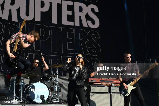 Kevin Bivona, Jesse Bivona, Aimee Allen and Justin Bivona of The Interrupters perform during Riot Fest 2023 at Douglass Park on September 15, 2023 in...