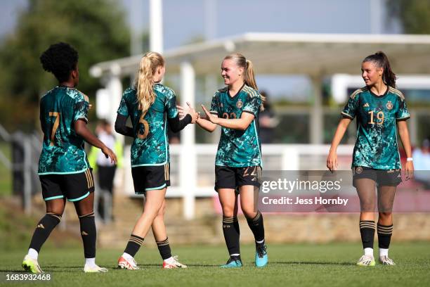 Svea Stoldt of Germany celebrates scoring their side's fourth goal with team-mates during the international friendly match between Germany Women U19...