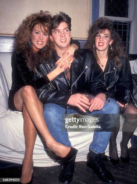 Model Jessica Hahn, half-brother Danny Moylan and his girlfriend attend Jessica Hahn's Chanukah Party on December 11, 1990 at the Limelight in New...