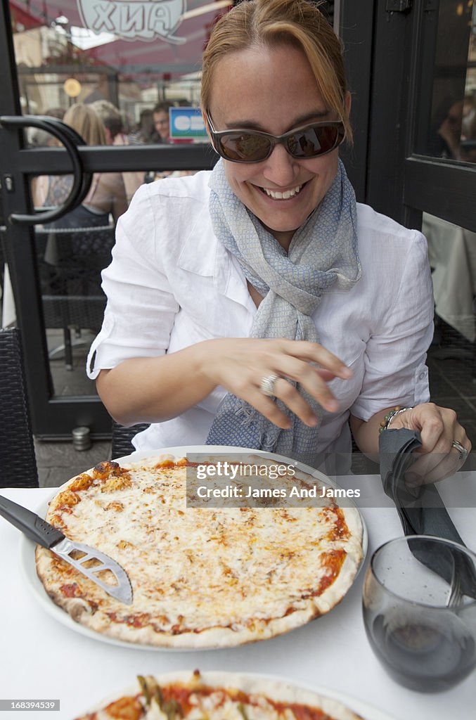 Girl Eating Cheese Pizza