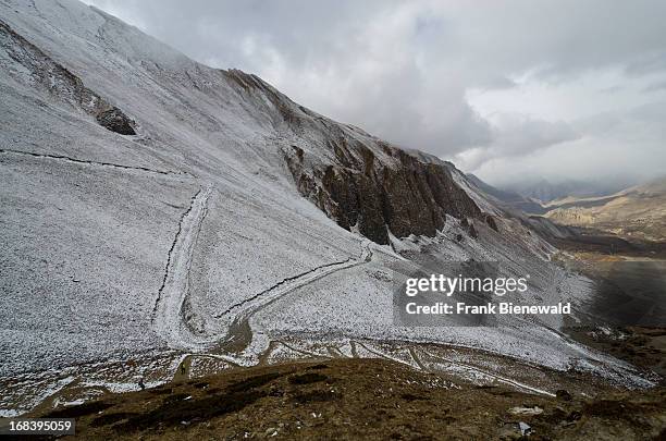 Looking down to Muktinath from below Thorong Thorong La Pass , the highest point on the Annapurna Circuit in Nepal which is regarded as one of the...