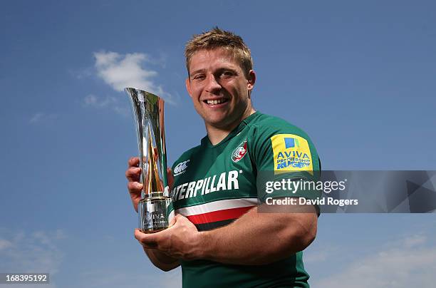 Tom Youngs of Leicester Tigers holds the Aviva Premiership Rugby Player of the Season trophy at the Leicester Tigers training ground on May 7, 2013...