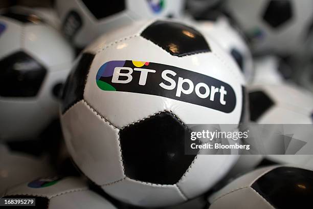 Branded soccer balls sit on display during the launch of BT Group Plc's new sports television channel BT Sport, at the company's offices in London,...