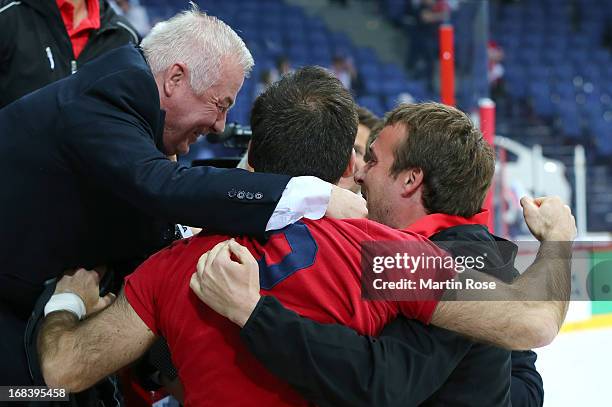 Dave Henderson , head coach of France celebrates after the IIHF World Championship group H match between Russia and France at Hartwall Areena on May...