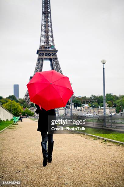 rainy day in paris - xlarge - female fashion with umbrella stock pictures, royalty-free photos & images