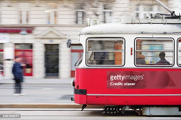 street car, tram, panning blurred background - vienna stock pictures, royalty-free photos & images