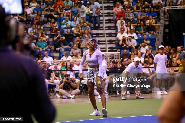 Venus Williams prepares to serve during the Venus Williams vs. Mónica Puig Exhibition Match at Coliseo de Puerto Rico José Miguel Agrelot on...