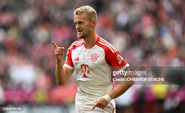 Bayern Munich's Dutch defender Matthijs de Ligt celebrates after scoring the 3-0 goal during the German first division Bundesliga football match...