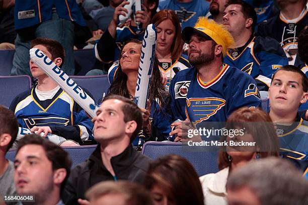 St. Louis Blues fans cheer on their team as they play the Los Angeles Kings in Game Five of the Western Conference Quarterfinals during the 2013 NHL...