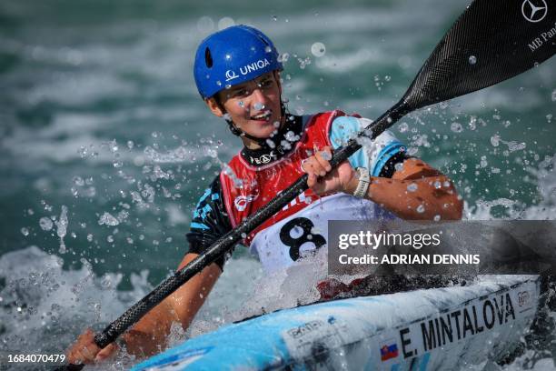 Slovakia's Eliska Mintalova reacts as she crosses the finish line in second place after the women's kayak final at the ICF Canoe Slalom World...