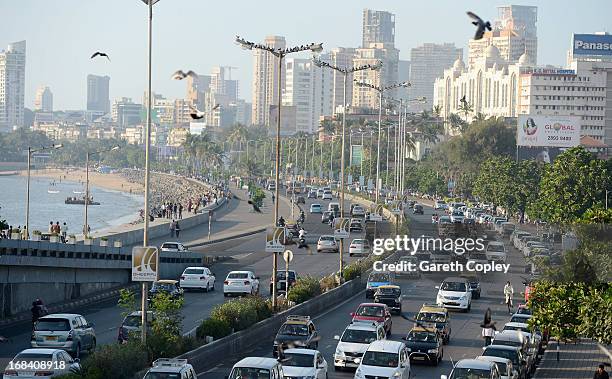 Traffic ways its way down Marine Drive on November 23, 2012 in Mumbai, India.